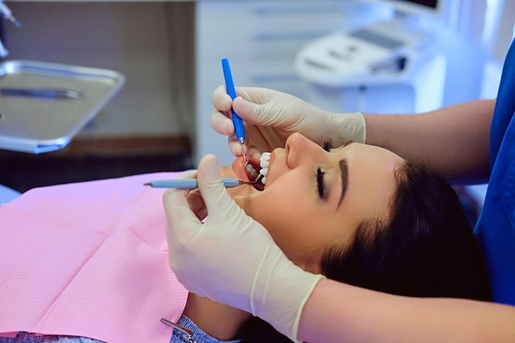 close up image dentist examining female s teeth dentistry 613910 15279