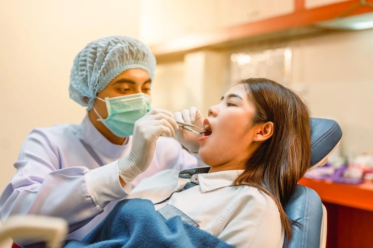 dentist examining teeth patients clinic better dental health bright smiledentist is scraping limestonedentist tools equipment 532405 3723