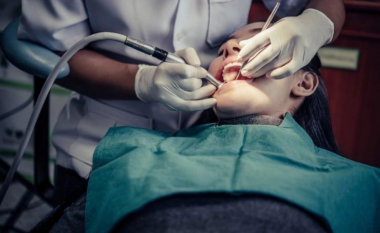 dentists treat patients teeth 1150 19648