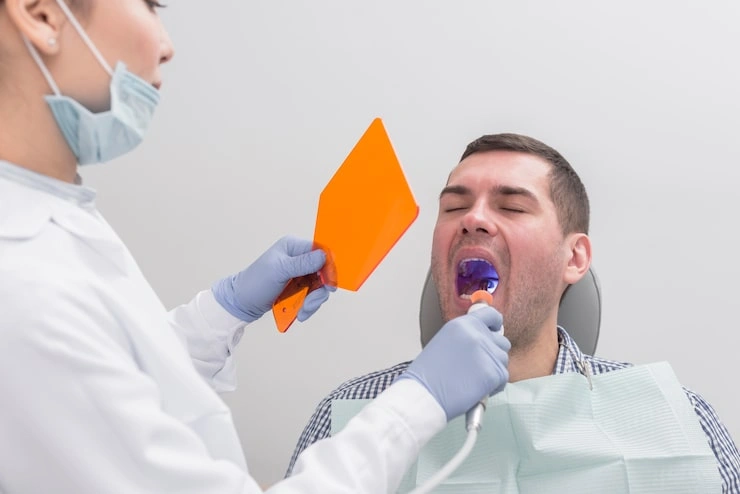 female dentist with patient 23 2148104932