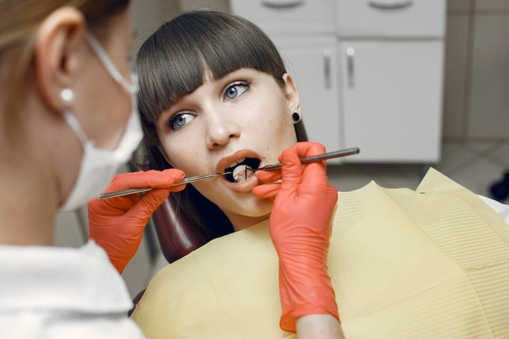 woman dental chair girl is examined by dentist beauty treats her teeth 1157 40915